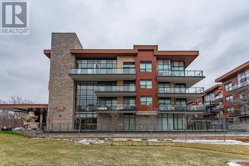 465 - 1575 Lakeshore Road W, Mississauga, ON - Outdoor With Balcony With Facade