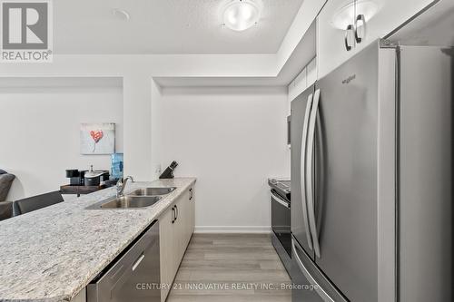 913 - 460 Dundas Street E, Hamilton, ON - Indoor Photo Showing Kitchen With Double Sink