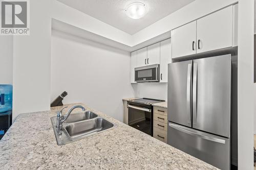 913 - 460 Dundas Street E, Hamilton, ON - Indoor Photo Showing Kitchen With Double Sink