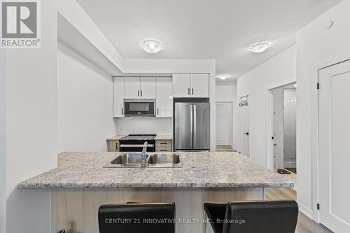 913 - 460 Dundas Street E, Hamilton, ON - Indoor Photo Showing Kitchen With Double Sink With Upgraded Kitchen