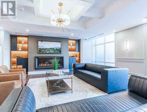 913 - 460 Dundas Street E, Hamilton, ON - Indoor Photo Showing Living Room With Fireplace