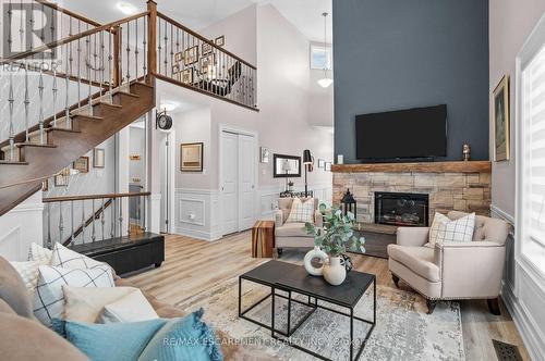 8 Burgundy Grove, Hamilton, ON - Indoor Photo Showing Living Room With Fireplace