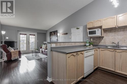 404 - 4015 Kilmer Drive, Burlington, ON - Indoor Photo Showing Kitchen With Double Sink