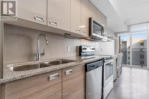 504 - 308 Lester Street, Waterloo, ON - Indoor Photo Showing Kitchen With Double Sink