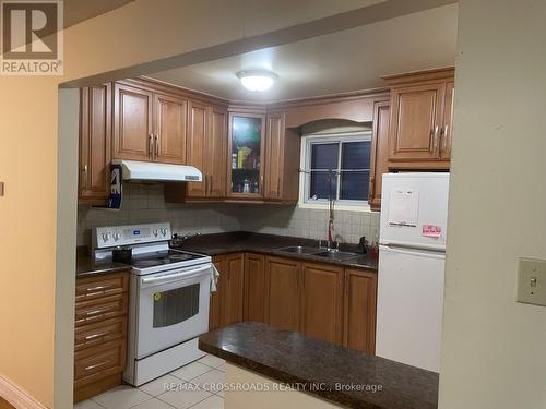 32 Briarwood Avenue, Toronto, ON - Indoor Photo Showing Kitchen With Double Sink