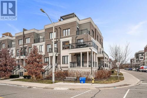 21 - 70 Eastwood Park Gardens, Toronto, ON - Outdoor With Balcony With Facade