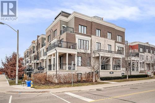 21 - 70 Eastwood Park Gardens, Toronto, ON - Outdoor With Balcony With Facade