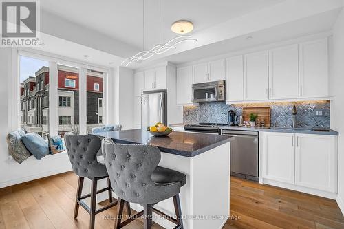 21 - 70 Eastwood Park Gardens, Toronto, ON - Indoor Photo Showing Kitchen With Stainless Steel Kitchen With Upgraded Kitchen