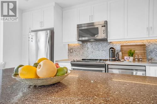 21 - 70 Eastwood Park Gardens, Toronto, ON - Indoor Photo Showing Kitchen With Upgraded Kitchen