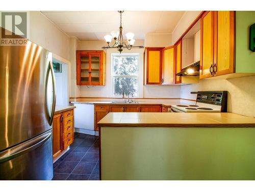 129 Maple Street, Revelstoke, BC - Indoor Photo Showing Kitchen With Double Sink