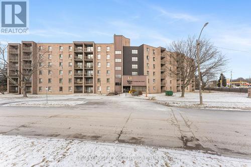 411 - 17 Eldon Hall Place, Kingston (Central City West), ON - Outdoor With Facade