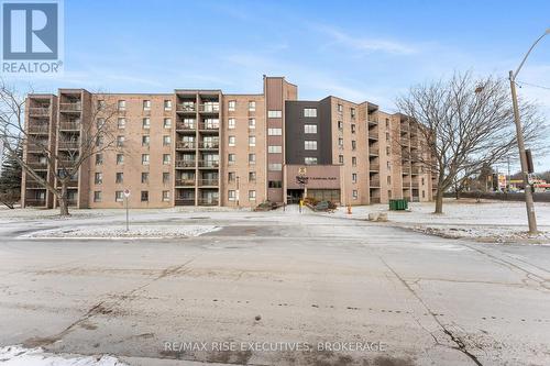 411 - 17 Eldon Hall Place, Kingston (Central City West), ON - Outdoor With Balcony With Facade