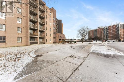 411 - 17 Eldon Hall Place, Kingston (Central City West), ON - Outdoor With Balcony With Facade