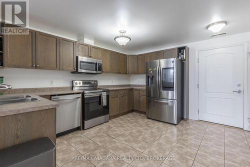 139 - 6350 Dorchester Road, Niagara Falls (216 - Dorchester), ON - Indoor Photo Showing Kitchen With Stainless Steel Kitchen With Double Sink