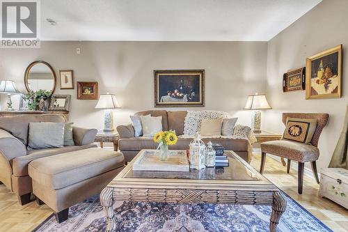 213 - 2030 Cleaver Avenue, Burlington, ON - Indoor Photo Showing Living Room