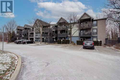 213 - 2030 Cleaver Avenue, Burlington, ON - Outdoor With Balcony With Facade