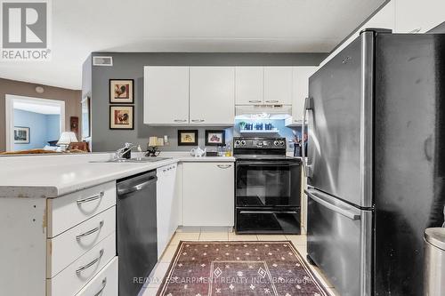 213 - 2030 Cleaver Avenue, Burlington, ON - Indoor Photo Showing Kitchen