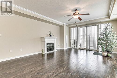 108 - 1030 Coronation Drive N, London, ON - Indoor Photo Showing Living Room With Fireplace