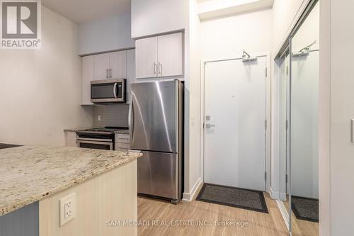 320 - 4055 Parkside Village Drive, Mississauga, ON - Indoor Photo Showing Kitchen