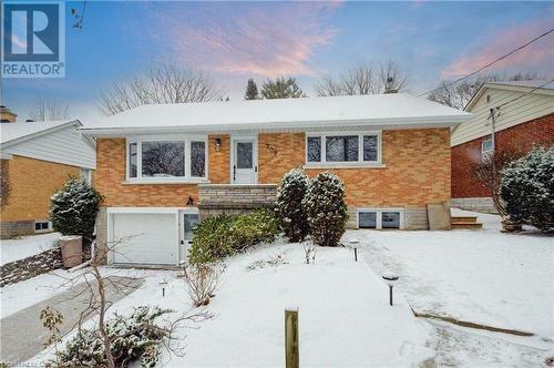 View of front of house featuring a garage - 209 Cornwall Street, Waterloo, ON - Outdoor