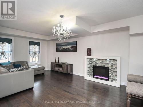 90 - 2280 Baronwood Drive, Oakville, ON - Indoor Photo Showing Living Room With Fireplace