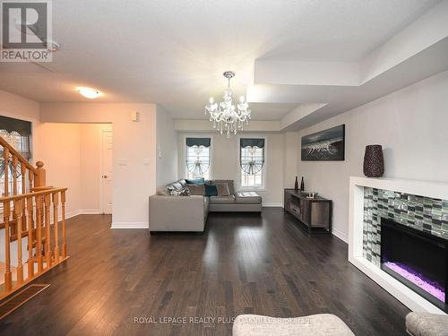 90 - 2280 Baronwood Drive, Oakville, ON - Indoor Photo Showing Living Room With Fireplace