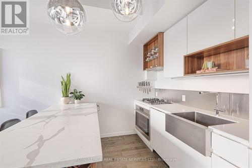 Ph2 - 383 Sorauren Avenue, Toronto, ON - Indoor Photo Showing Kitchen With Double Sink