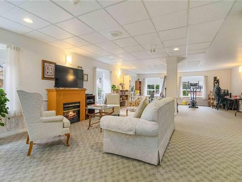 411-3133 Tillicum Rd, Saanich, BC - Indoor Photo Showing Living Room With Fireplace