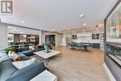 307 - 470 Dundas Street E, Hamilton, ON - Indoor Photo Showing Living Room With Fireplace