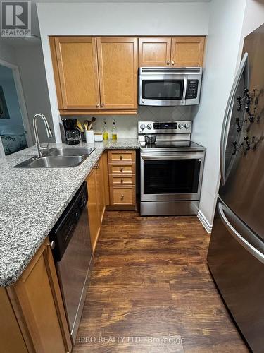 1717 - 335 Rathburn Road W, Mississauga, ON - Indoor Photo Showing Kitchen With Double Sink