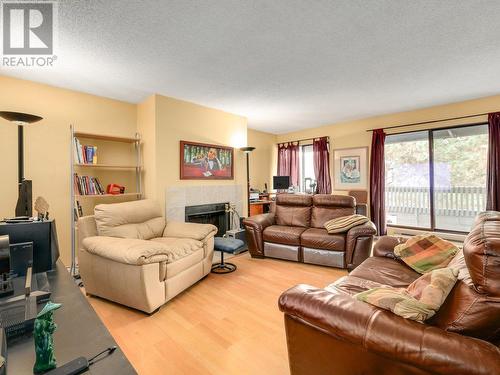 305 8400 Ackroyd Road, Richmond, BC - Indoor Photo Showing Living Room With Fireplace