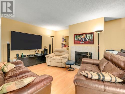 305 8400 Ackroyd Road, Richmond, BC - Indoor Photo Showing Living Room With Fireplace