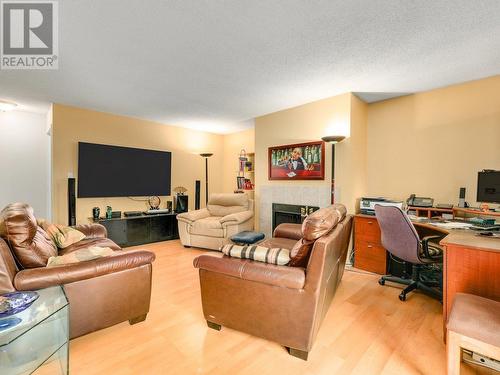 305 8400 Ackroyd Road, Richmond, BC - Indoor Photo Showing Living Room With Fireplace