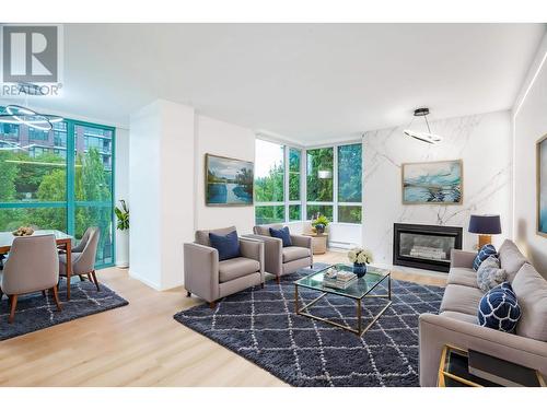 204 8280 Westminster Highway, Richmond, BC - Indoor Photo Showing Living Room With Fireplace