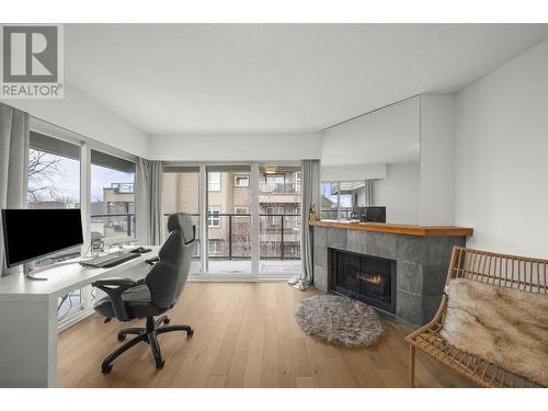 307 1515 Chesterfield Avenue, North Vancouver, BC - Indoor Photo Showing Office With Fireplace