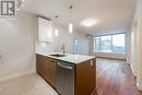 703 6951 Elmbridge Way, Richmond, BC  - Indoor Photo Showing Kitchen With Double Sink 