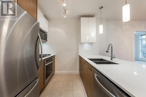 703 6951 Elmbridge Way, Richmond, BC - Indoor Photo Showing Kitchen With Stainless Steel Kitchen With Double Sink With Upgraded Kitchen