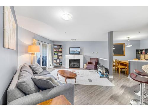 311 19366 65 Street, Surrey, BC - Indoor Photo Showing Living Room With Fireplace