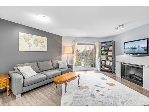 311 19366 65 Street, Surrey, BC - Indoor Photo Showing Living Room With Fireplace