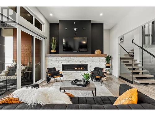 3324 Black Pine Lane, Kelowna, BC - Indoor Photo Showing Living Room With Fireplace