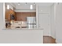 217 13468 King George Boulevard, Surrey, BC  - Indoor Photo Showing Kitchen 