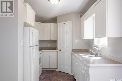 A & B 2030 Edgar Street, Regina, SK - Indoor Photo Showing Kitchen With Double Sink