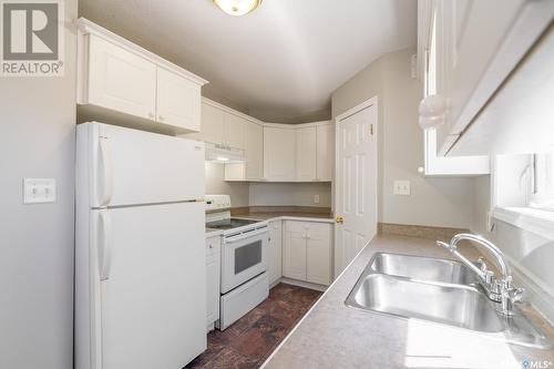 A & B 2030 Edgar Street, Regina, SK - Indoor Photo Showing Kitchen With Double Sink