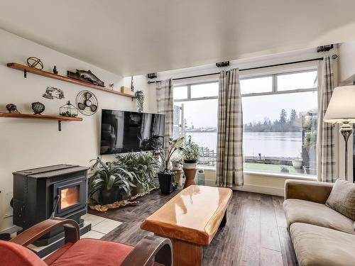 1A 20837 Louie Crescent, Langley, BC - Indoor Photo Showing Living Room With Fireplace