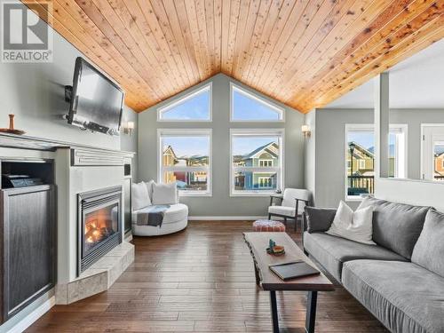 76 Aksala Drive, Whitehorse, YT - Indoor Photo Showing Living Room With Fireplace