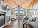 76 Aksala Drive, Whitehorse, YT  - Indoor Photo Showing Living Room With Fireplace 