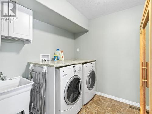 76 Aksala Drive, Whitehorse, YT - Indoor Photo Showing Laundry Room