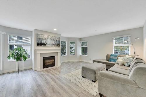 23 9036 208 Street, Langley, BC - Indoor Photo Showing Living Room With Fireplace