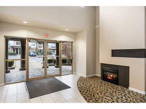 402 33546 Holland Avenue, Abbotsford, BC - Indoor With Fireplace