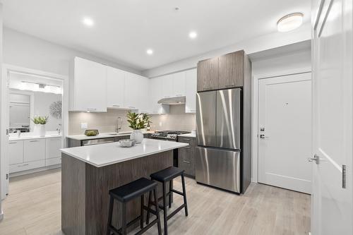 403 3317 148 Street, Surrey, BC - Indoor Photo Showing Kitchen With Upgraded Kitchen